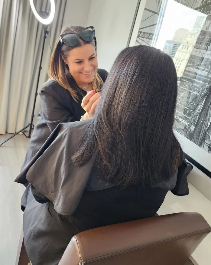 Kelly La Banco applying makeup on location in Chicago